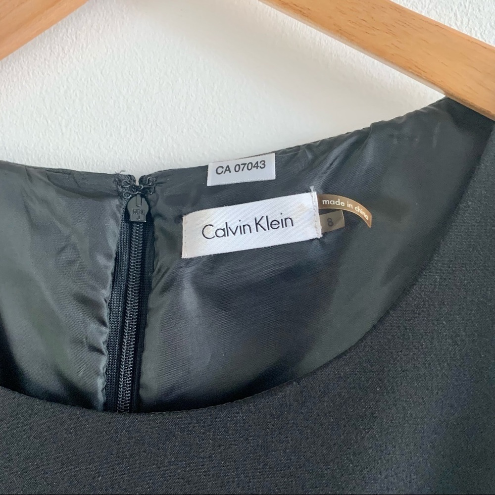 CALVIN KLEIN Simple Cap Sleeve Peplum Skirt Jewel Neck Black Midi Dress Stretch - Picture 5 of 15